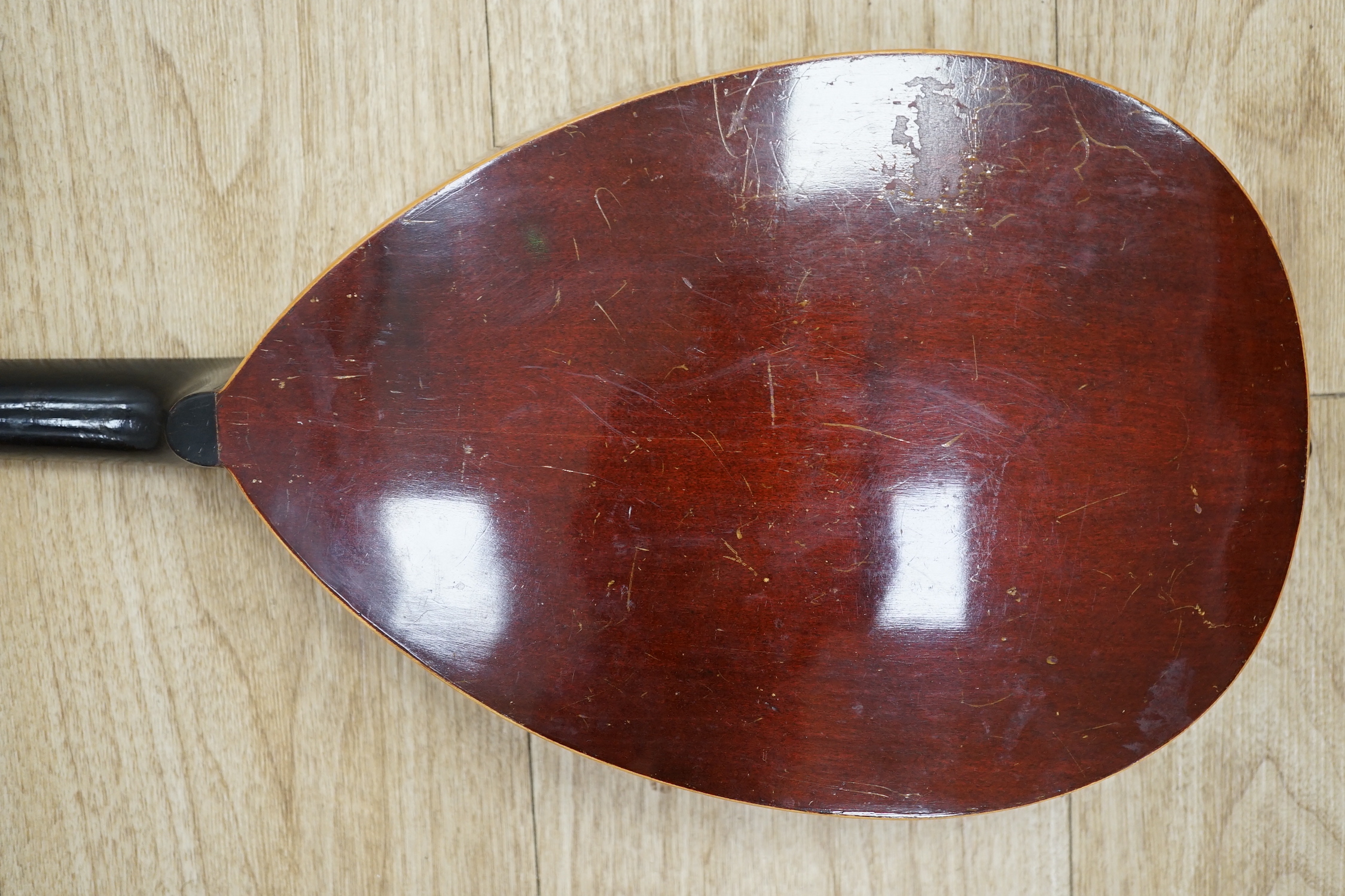 A 1920's Swiss flat backed mandolin, length of body 31cm